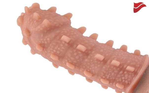 Насадка на фаллос с шипами и продолговатыми бугорками Насадка на фаллос с шипами и продолговатыми бугорками