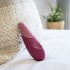 Розовый клиторальный вибратор «Vibe» от «Womanizer» 